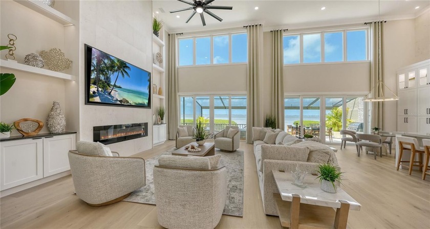 Immerse yourself in the epitome of coastal luxury living at this - Beach Home for sale in Longboat Key, Florida on Beachhouse.com