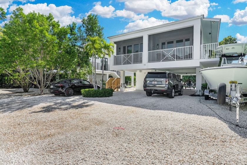 Discover the epitome of coastal living in this stunning, newer - Beach Home for sale in Key Largo, Florida on Beachhouse.com