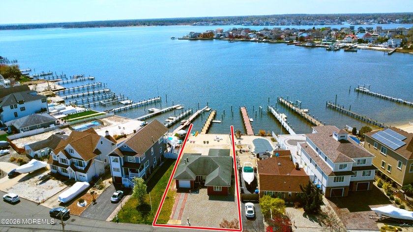 This solid brick ranch commands a prime position on Silver Bay - Beach Home for sale in Toms River, New Jersey on Beachhouse.com