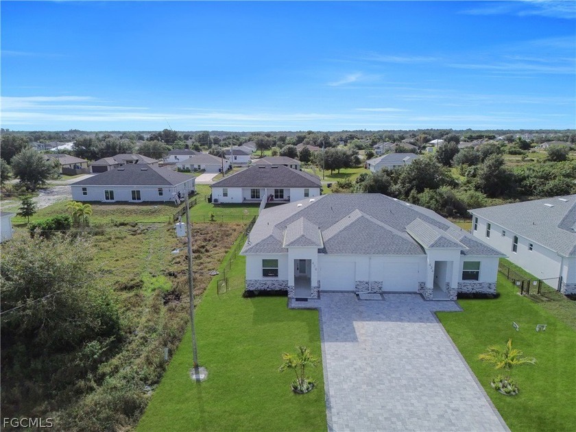 SELLER MOTIVATED! NEW CONSTRUCTION DUPLEX Located in one of the - Beach Home for sale in Lehigh Acres, Florida on Beachhouse.com