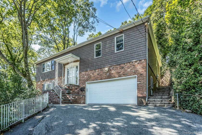 Nestled mid-block on a quiet, tree-lined street, this - Beach Home for sale in Port Washington, New York on Beachhouse.com