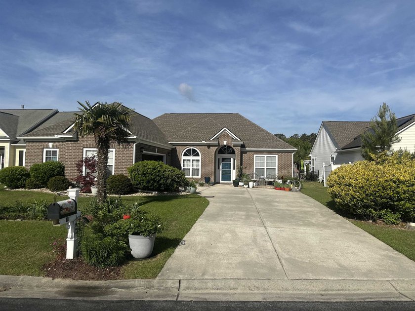 Welcome to your light-filled retreat in the highly sought-after - Beach Home for sale in Calabash, North Carolina on Beachhouse.com