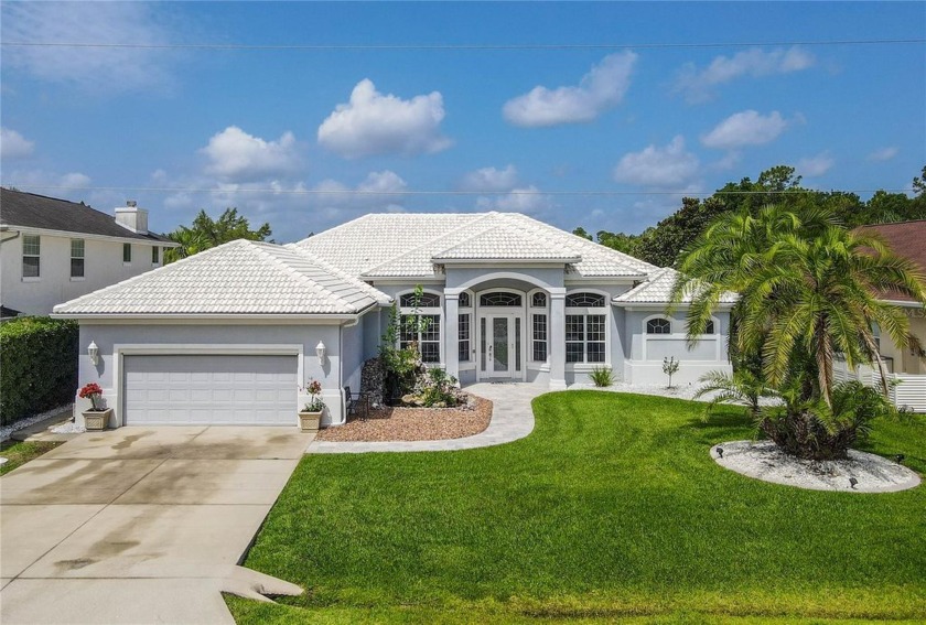 Step inside this one-of-a-kind Pool Home located on Saltwater - Beach Home for sale in Palm Coast, Florida on Beachhouse.com
