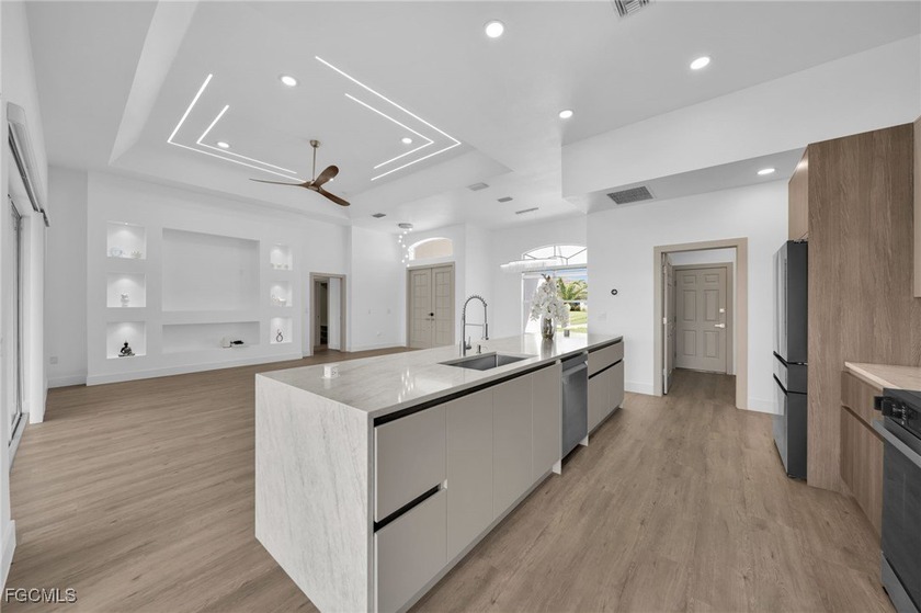 This beautiful 3-bedroom, 2-bathroom modern-style home offers - Beach Home for sale in Cape Coral, Florida on Beachhouse.com