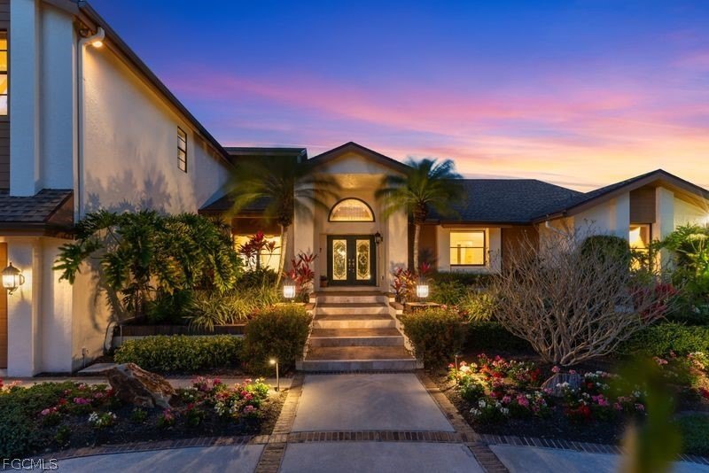 Welcome home!! This custom-built lakefront residence is a rare - Beach Home for sale in Fort Myers, Florida on Beachhouse.com