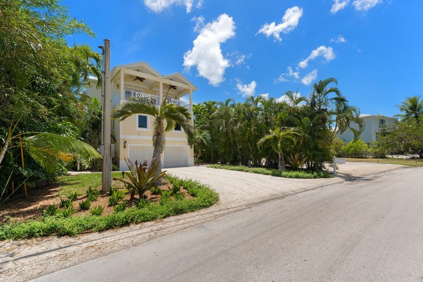 Nestled in North Key Largo, this canal-front residence in Key - Beach Home for sale in Key Largo, Florida on Beachhouse.com