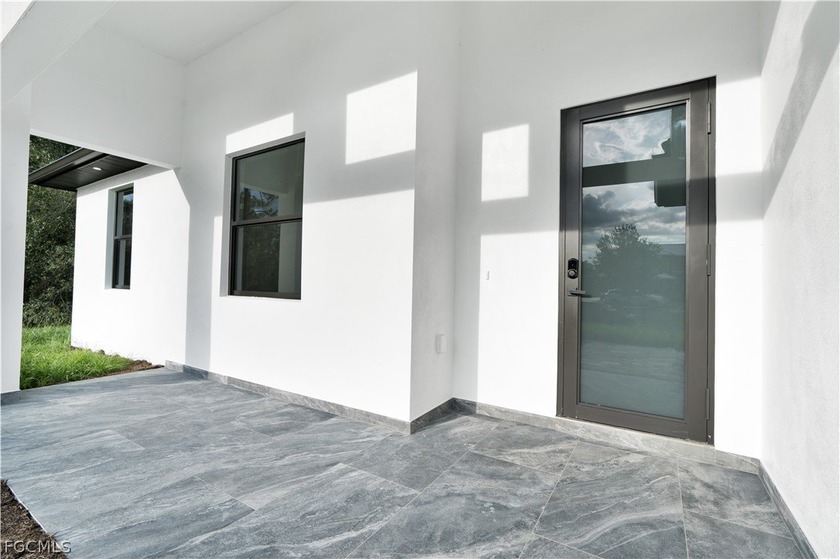 0.5 ACRES | 4 BEDROOMS | 3 FULL BATHS - including TWO suites - Beach Home for sale in Lehigh Acres, Florida on Beachhouse.com