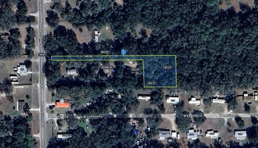 This spacious 0.75-acre parcel in the established Mayfair Garden - Beach Lot for sale in Crystal River, Florida on Beachhouse.com