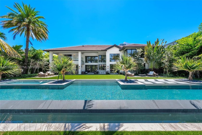 Welcome to 110 Holiday Dr in Golden Isles, a tropical modern - Beach Home for sale in Hallandale Beach, Florida on Beachhouse.com