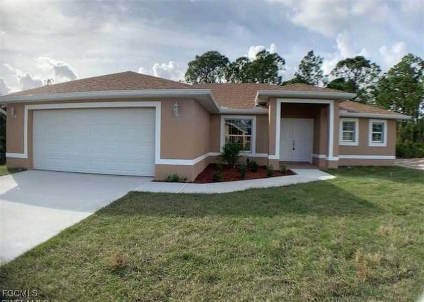 Built in 2019 and set on a rare half-acre lot, this 3-bedroom - Beach Home for sale in Lehigh Acres, Florida on Beachhouse.com