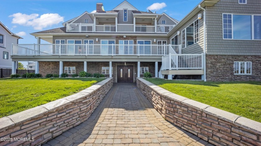 Perfectly positioned along the coast, this extraordinary 5 - Beach Home for sale in Monmouth Beach, New Jersey on Beachhouse.com