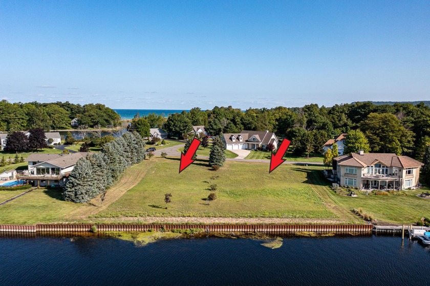 100 feet of EXCEPTIONAL LAKE FRONTAGE improved & protected with - Beach Lot for sale in Arcadia, Michigan on Beachhouse.com