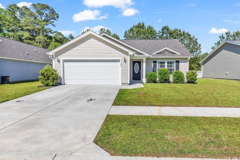 Discover Lowcountry living in this charming three-bedroom - Beach Home for sale in Georgetown, South Carolina on Beachhouse.com