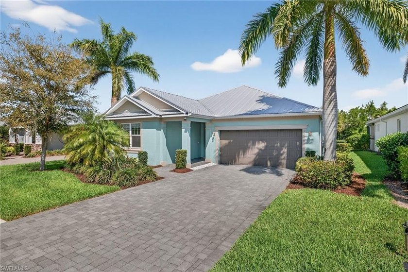 This 3 bedroom, 2 bathroom single-family *Lazio* model by Ashton - Beach Home for sale in Naples, Florida on Beachhouse.com