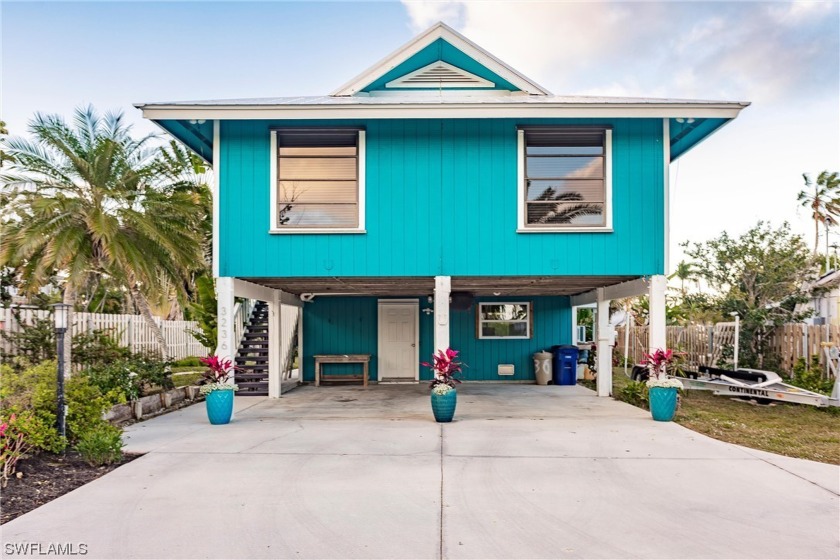 This Florida Pine constructed stilt home sits on the Phillips - Beach Home for sale in ST. James City, Florida on Beachhouse.com