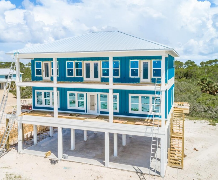 Construction is underway for this custom home with 124 feet of - Beach Home for sale in St. George Island, Florida on Beachhouse.com