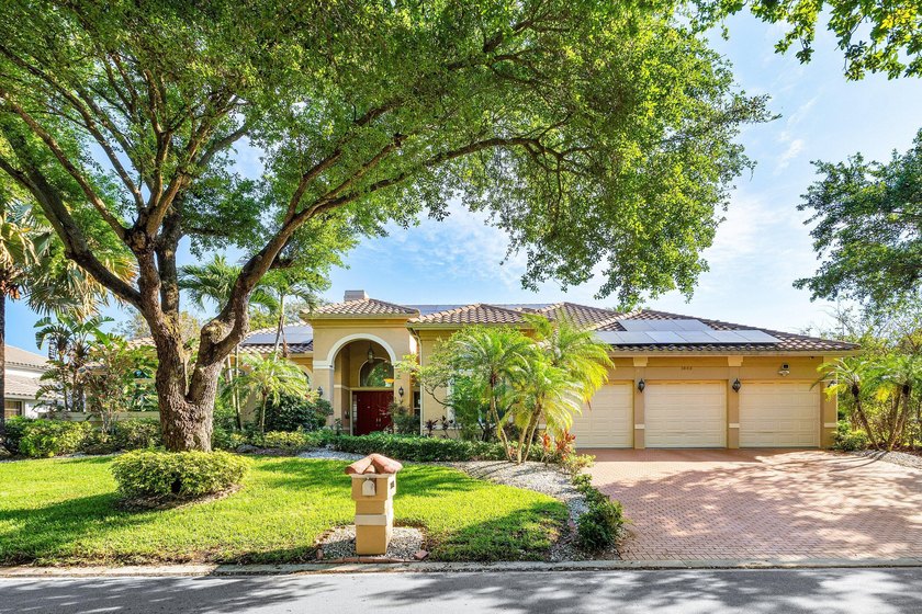 Located behind the guarded gates of Eagle Trace & set on one of - Beach Home for sale in Coral Springs, Florida on Beachhouse.com