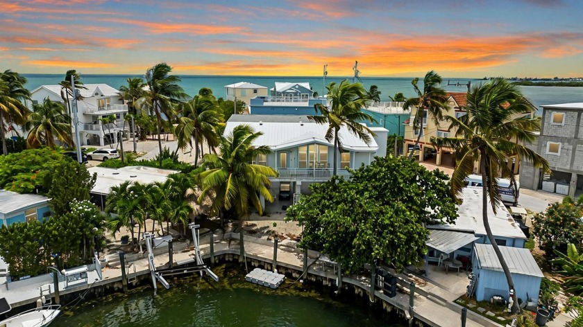 Nestled in the heart of the charming island of Conch Key, this - Beach Home for sale in Conch Key, Florida on Beachhouse.com