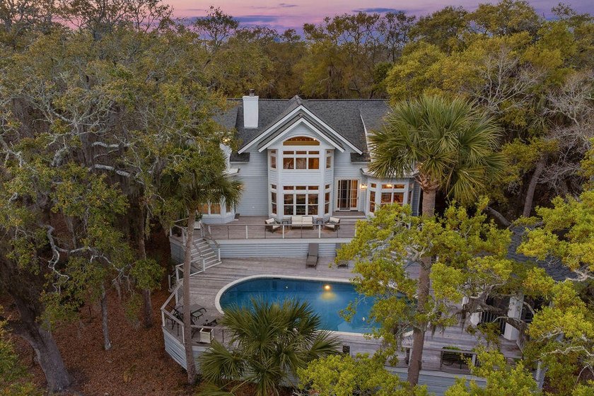 Perfectly nestled among gorgeous live oaks, this beautiful home - Beach Home for sale in Seabrook Island, South Carolina on Beachhouse.com