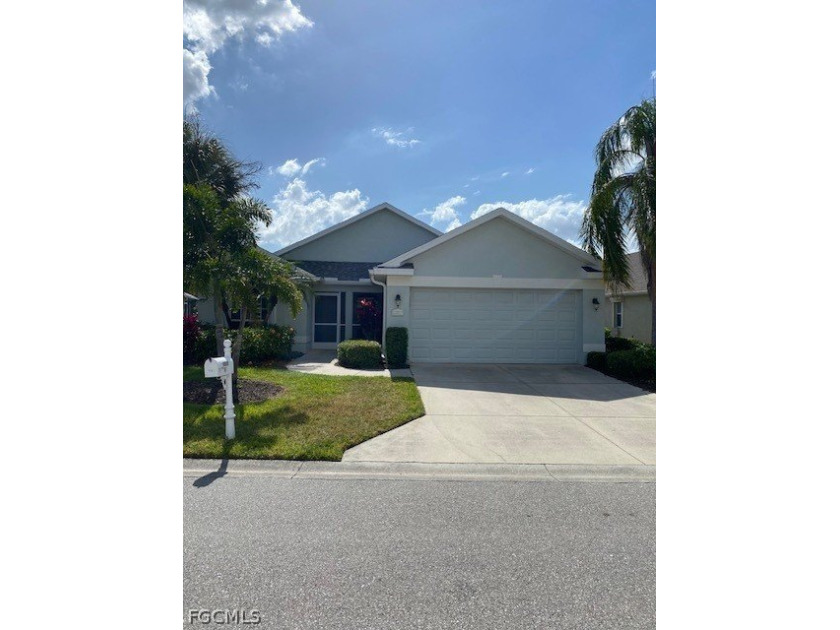 Nice waterfront home on community pond with great sunset views - Beach Home for sale in North Fort Myers, Florida on Beachhouse.com