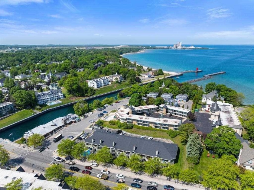 Live in the heart of Charlevoix with the ease of resort-style - Beach Condo for sale in Charlevoix, Michigan on Beachhouse.com