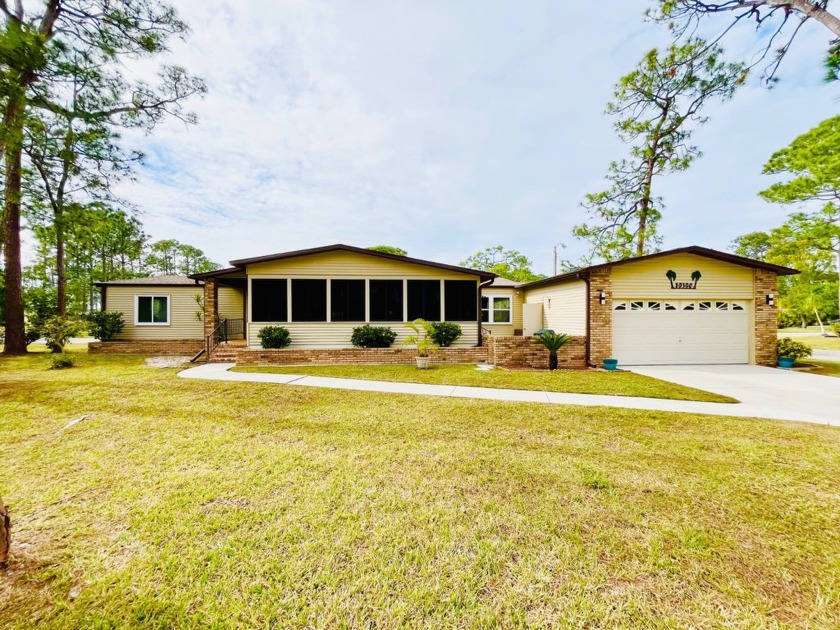 This spacious three-bedroom, two-bathroom home is located in the - Beach Home for sale in North Fort Myers, Florida on Beachhouse.com