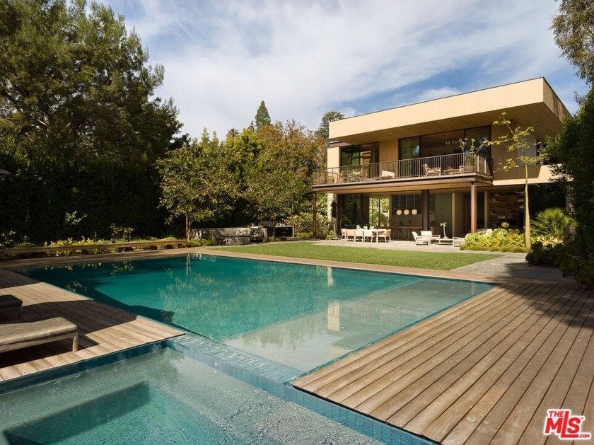 Presenting a one-of-a-kind, warm modern estate nestled in the - Beach Home for sale in Pacific Palisades, California on Beachhouse.com