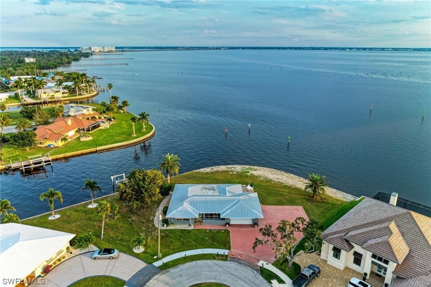 RARE OPPORTUNITY to own this 1/2 ACRE TIP LOT ON CHARLOTTE - Beach Home for sale in Port Charlotte, Florida on Beachhouse.com