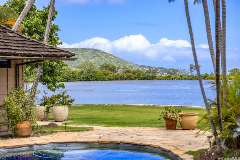 Gracious Mid-Century waterfront home nestled between the - Beach Home for sale in Honolulu, Hawaii on Beachhouse.com