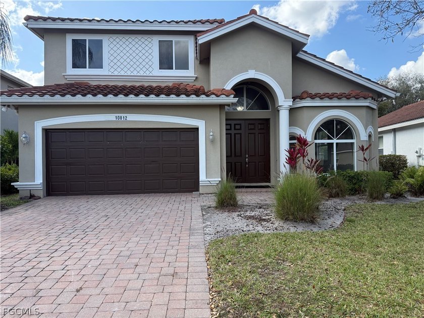 Lovely two-story home nestled in the highly desirable gated - Beach Home for sale in Lehigh Acres, Florida on Beachhouse.com