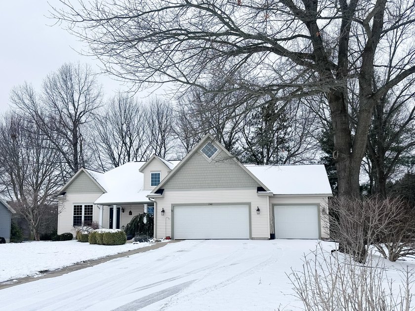 A RARE OPPORTUNITY NOT TO BE MISSED! Situated on a highly - Beach Home for sale in Grand Haven, Michigan on Beachhouse.com