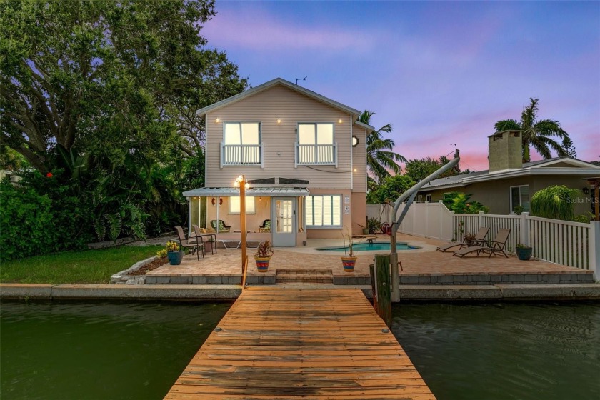Discover the essence of coastal living in this 4-bedroom, 3-bath - Beach Home for sale in Indian Rocks Beach, Florida on Beachhouse.com