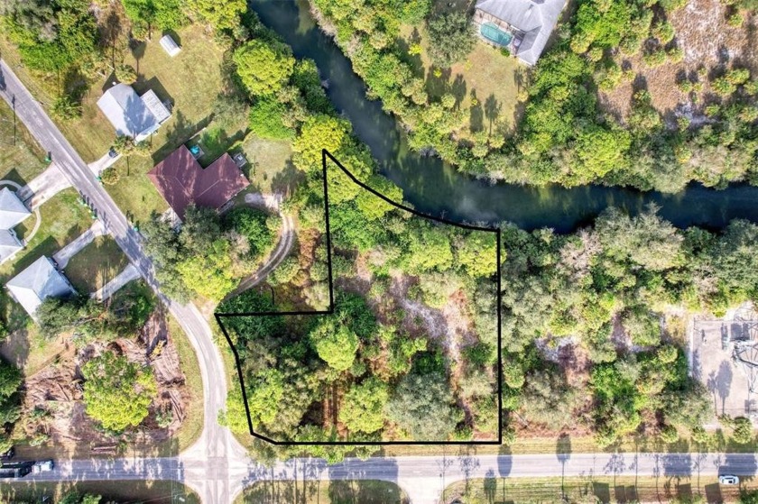 These two lots are just off U.S. 41, zoned Commercial General - Beach Lot for sale in Port Charlotte, Florida on Beachhouse.com