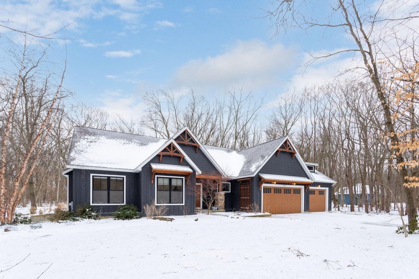 Nestled in the heart of Indian Point, this exceptional custom - Beach Home for sale in Saugatuck, Michigan on Beachhouse.com