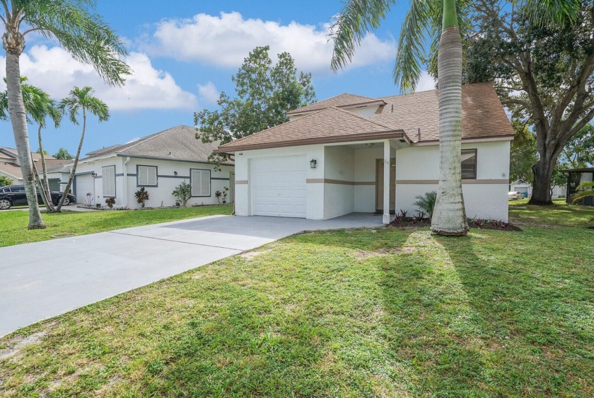 This charming 3-bedroom, 2-bath home with a 1-car garage is - Beach Home for sale in Boynton Beach, Florida on Beachhouse.com