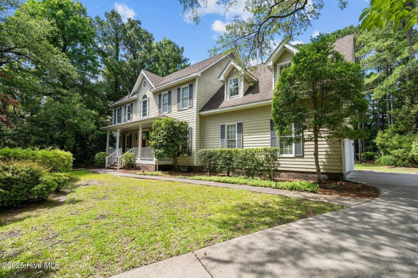 This timeless and spacious 4-bedroom, 3.5-bath colonial sits on - Beach Home for sale in Wilmington, North Carolina on Beachhouse.com