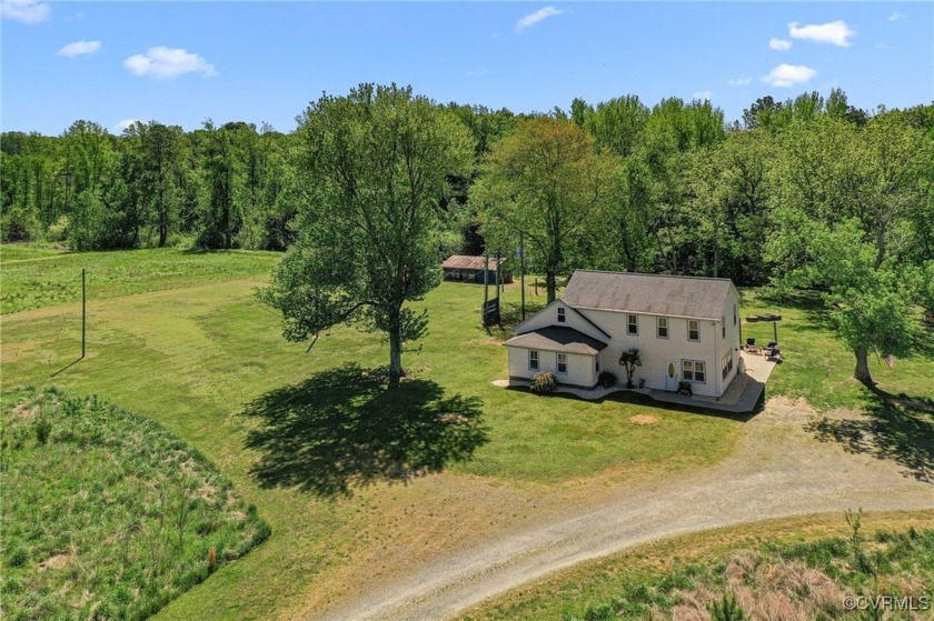 This well-maintained home offers peaceful living and plenty of - Beach Home for sale in Warsaw, Virginia on Beachhouse.com