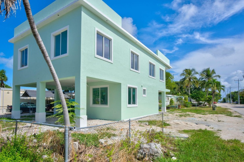 Welcome to your dream new construction home in Key Largo! This - Beach Home for sale in Key Largo, Florida on Beachhouse.com