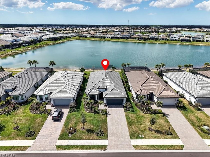 RARE CENTER-OF-THE-LAKE WATERFRONT HOME WITH BREATHTAKING SUNSET - Beach Home for sale in Estero, Florida on Beachhouse.com