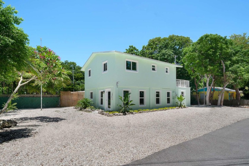 Located in a lovely Upper Keys neighborhood, this tastefully - Beach Home for sale in Key Largo, Florida on Beachhouse.com