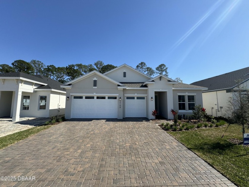 Welcome to the Egret Model Home by Jones Homes USA! This - Beach Home for sale in Daytona Beach, Florida on Beachhouse.com