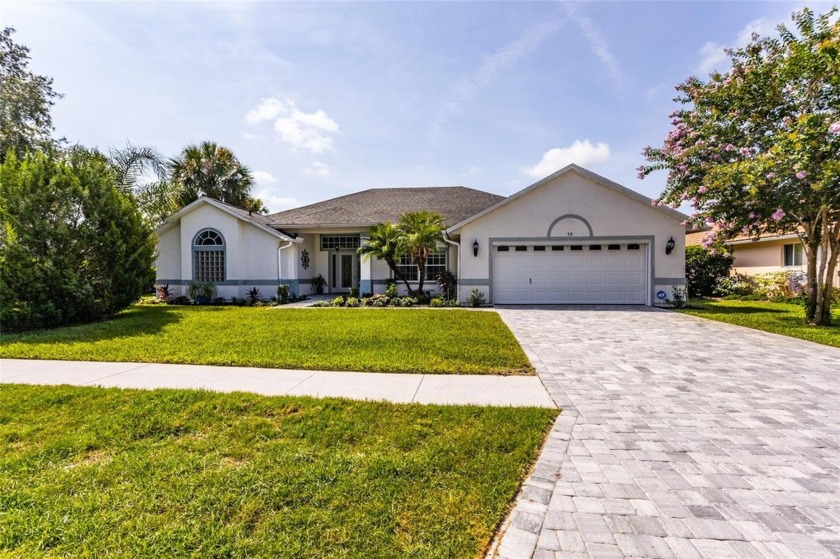 Lakeside Luxury in Palm Coast's Coveted Arlington Community - Beach Home for sale in Palm Coast, Florida on Beachhouse.com