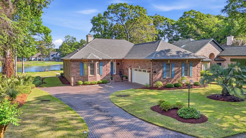 Set on a uniquely positioned homesite in Pawleys Plantation - Beach Home for sale in Pawleys Island, South Carolina on Beachhouse.com