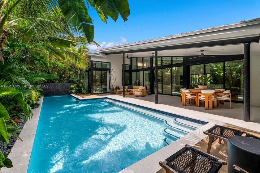 Welcome to a private, gated Mid-Century Modern residence - Beach Home for sale in Miami Beach, Florida on Beachhouse.com