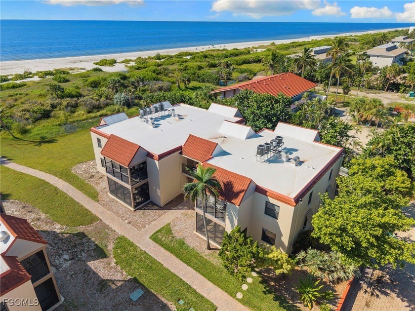 Welcome to your island retreat at Sanibel Moorings, a - Beach Condo for sale in Sanibel, Florida on Beachhouse.com
