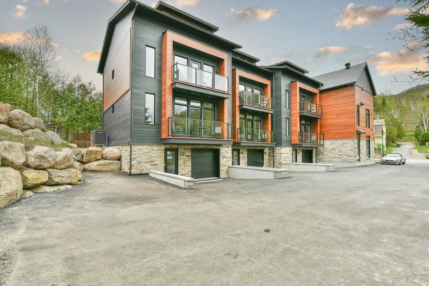 NEW CONSTRUCTION - Nestled right in the heart of Tremblant's Old - Beach Condo for sale in Mont-Tremblant,  on Beachhouse.com