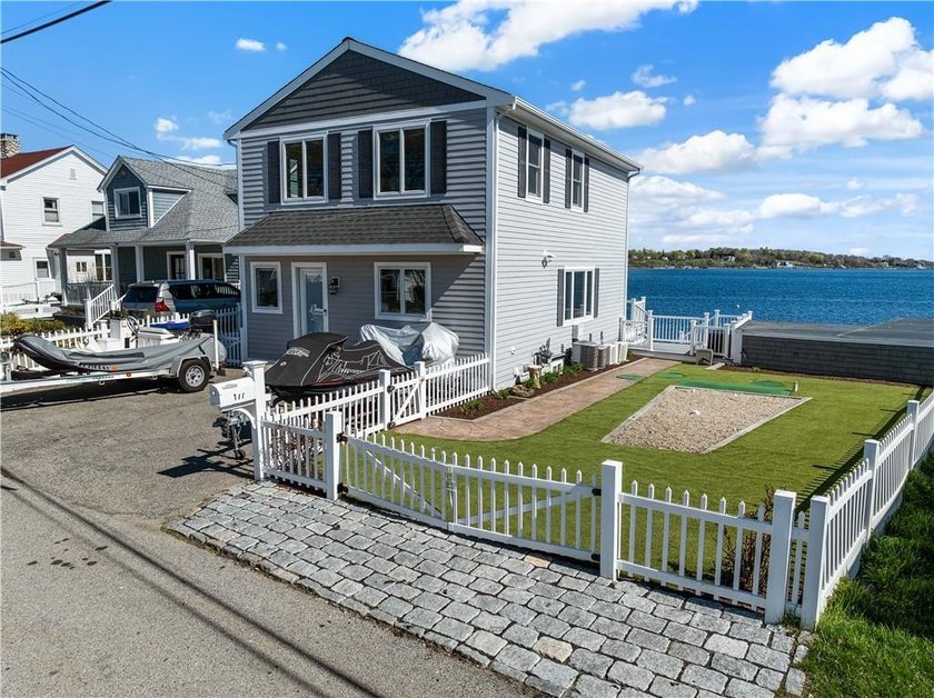 Experience coastal living at its finest at 177 Seaconnet - Beach Home for sale in Portsmouth, Rhode Island on Beachhouse.com