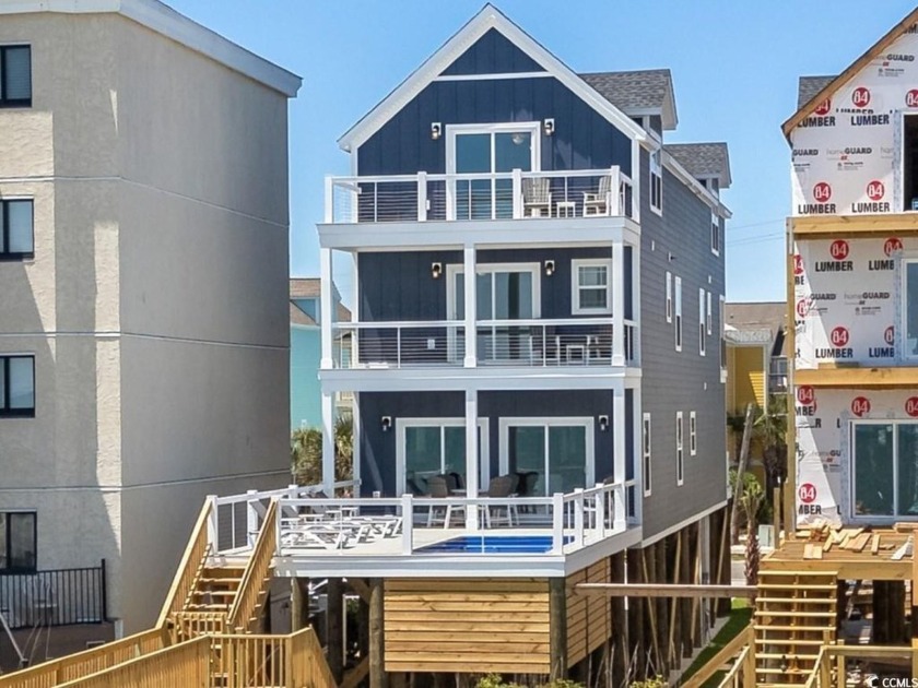 Perched directly on the pristine oceanfront of Surfside Beach - Beach Home for sale in Surfside Beach, South Carolina on Beachhouse.com
