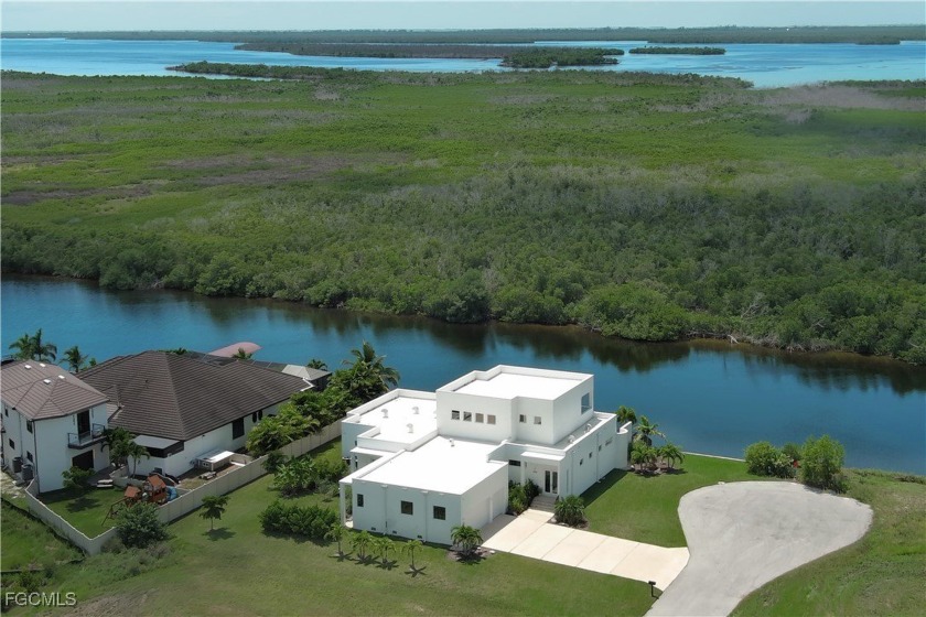 Refined luxury, lasting strength, and eco-minded design define - Beach Home for sale in Cape Coral, Florida on Beachhouse.com