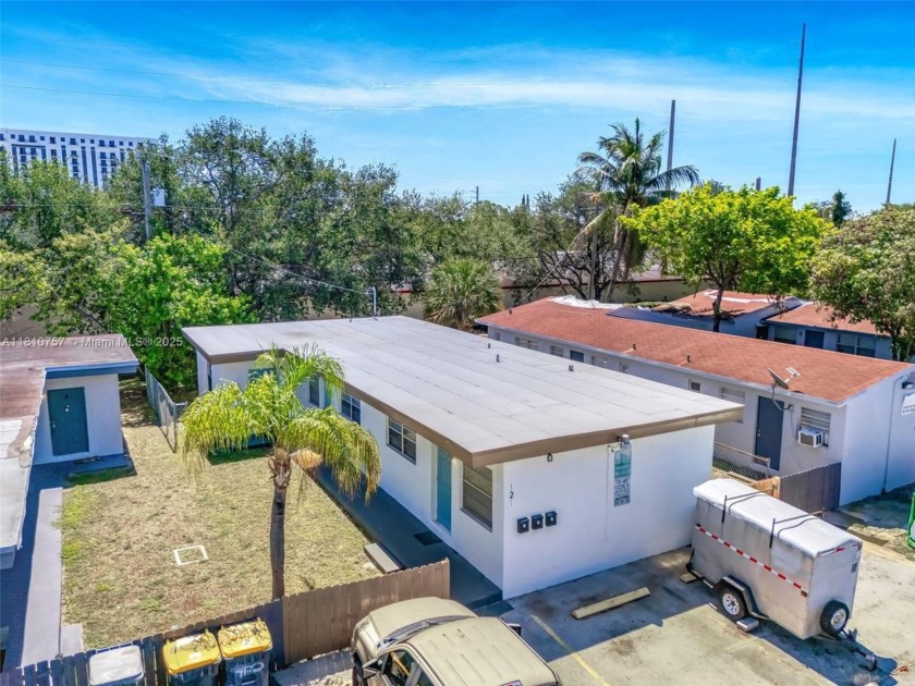 A beautifully maintained triplex offering an exceptional - Beach Home for sale in Dania, Florida on Beachhouse.com